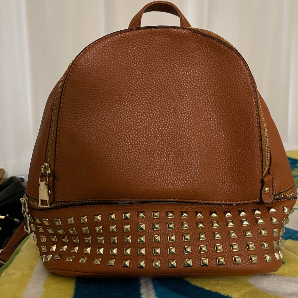 Cute very trendy backpack in excellent condition.